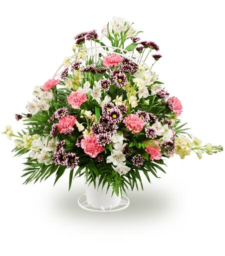 Mixed flowers in a handled basket - Same Day Flower Delivery